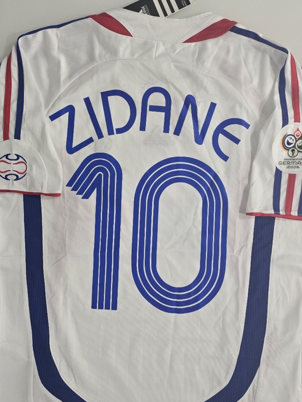 White Zidane #10 Soccer Jersey with Blue and Red Accents